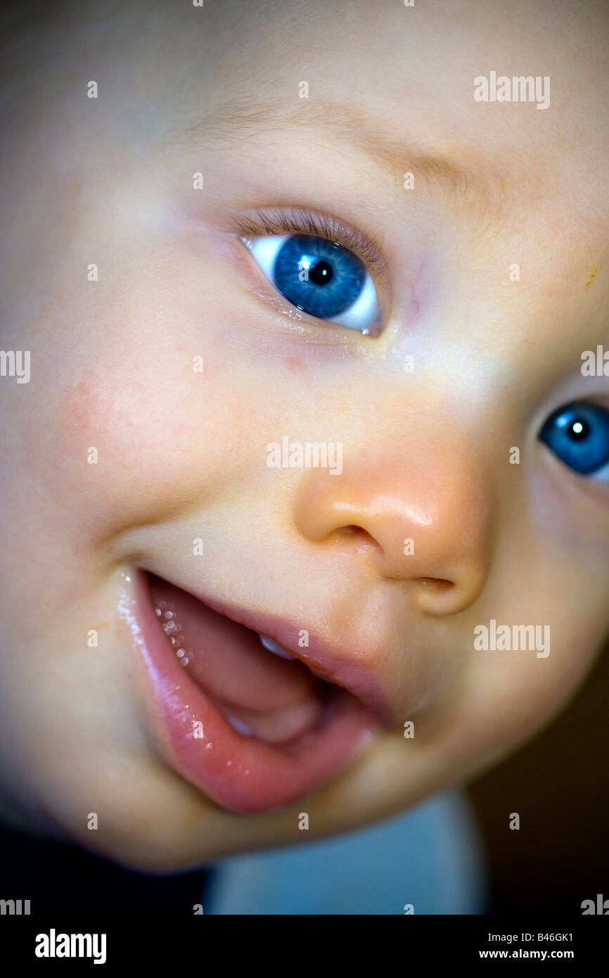Close up portrait of a blue eyed baby boy Stock Photo Alamy