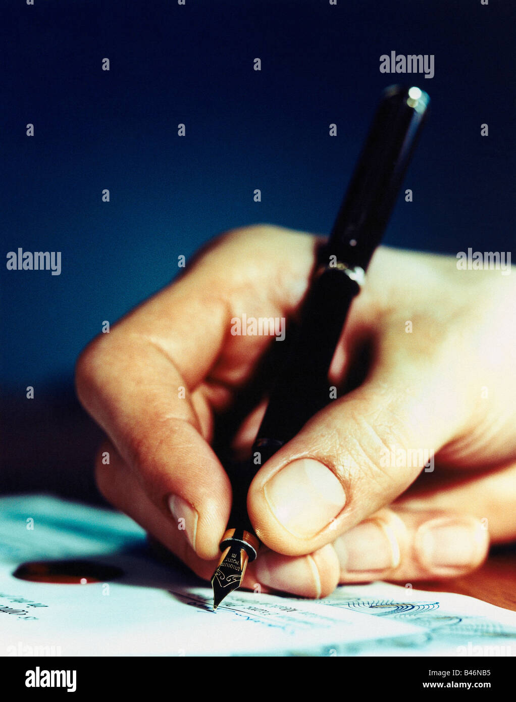 Hand Writing with Fountain Pen Stock Photo
