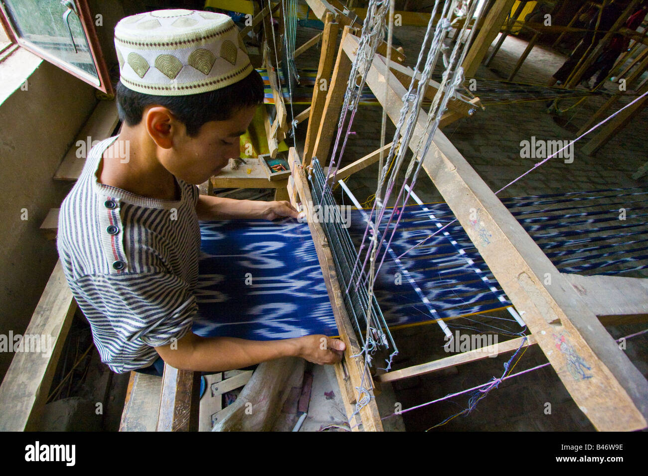 Uyghur in silk factory hotan hi-res stock photography and images - Alamy