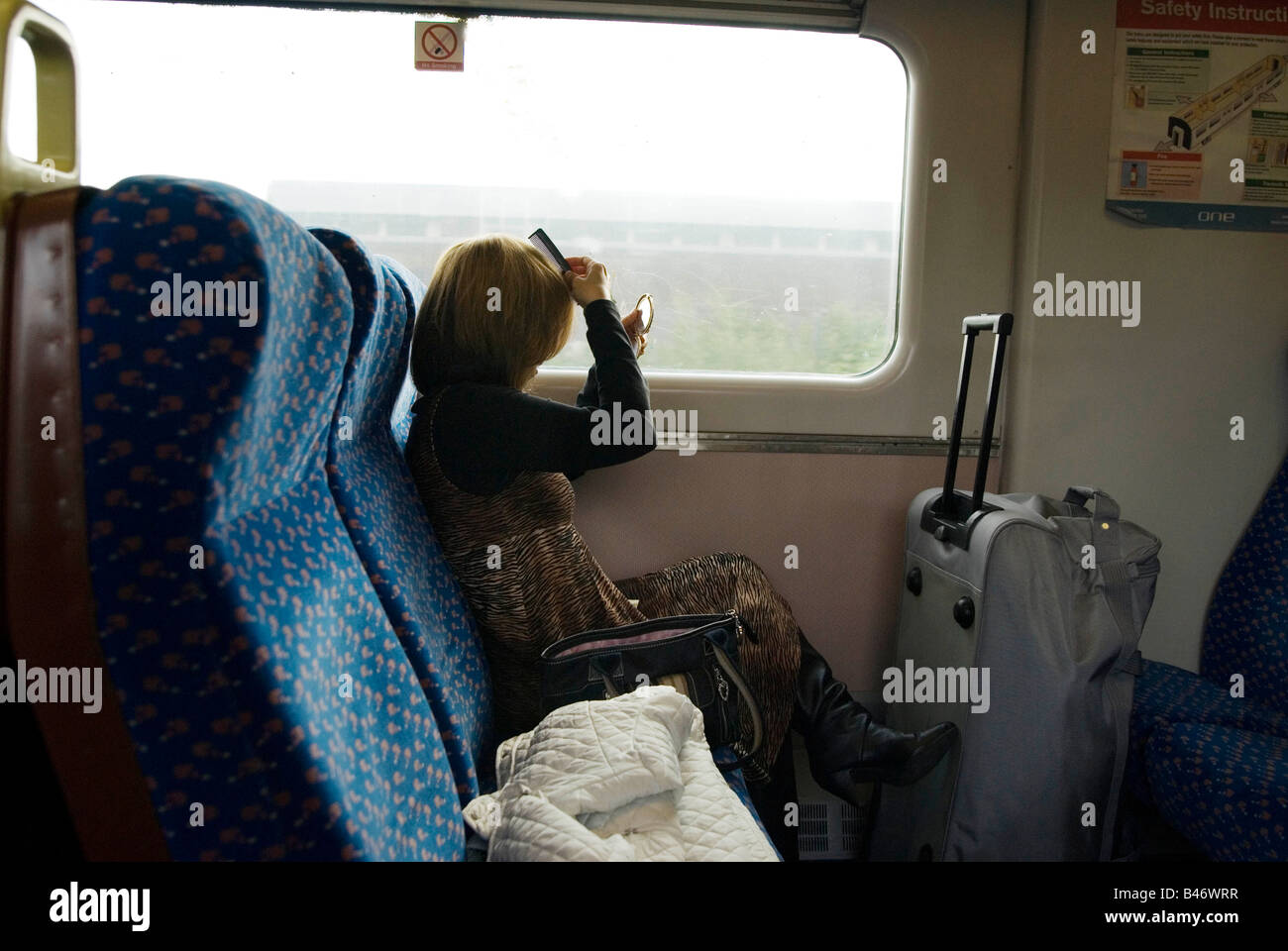 Woman on the train hi-res stock photography and images - Alamy