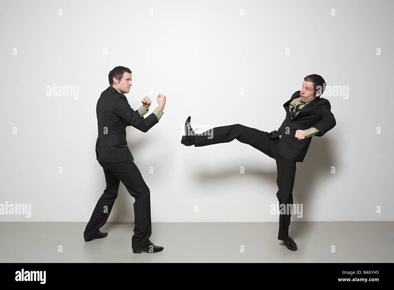 Man fighting himself Stock Photo