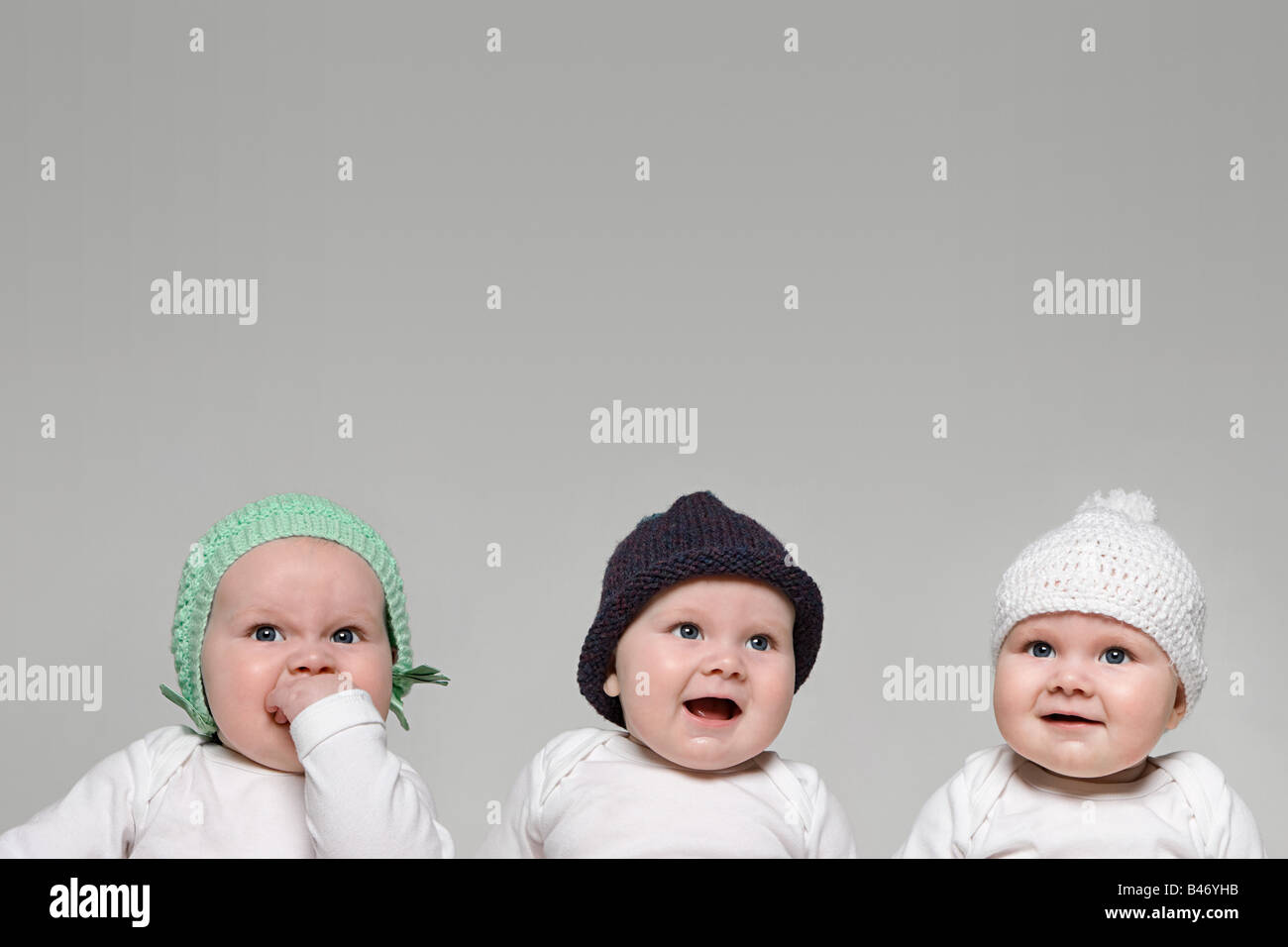 Babies in hats Stock Photo