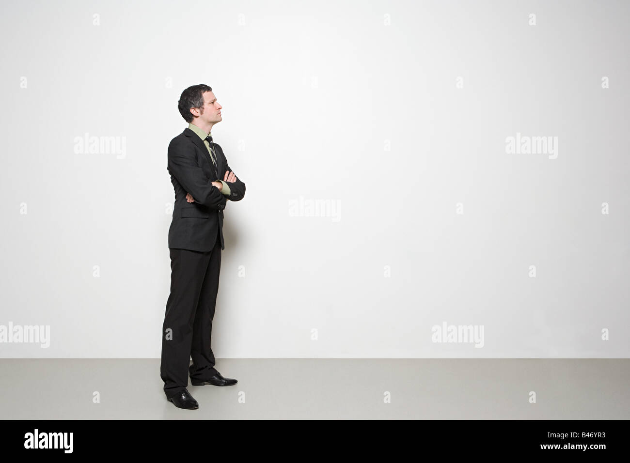 Businessman with arms crossed Stock Photo