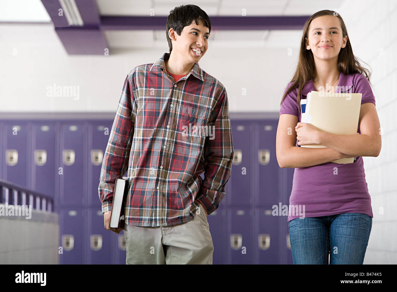 High school students walking down a corridor Stock Photo - Alamy