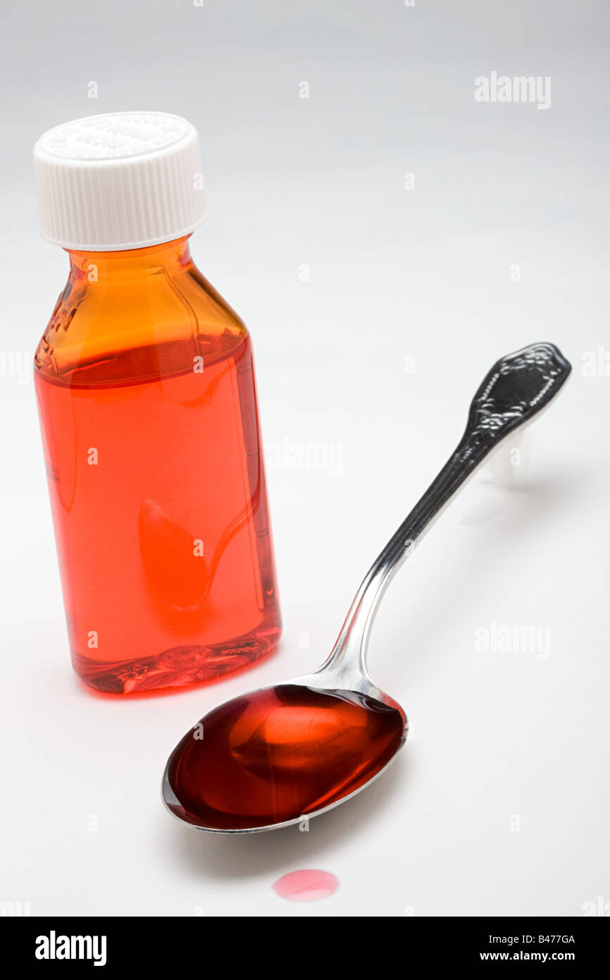 A medicine bottle and spoon Stock Photo Alamy