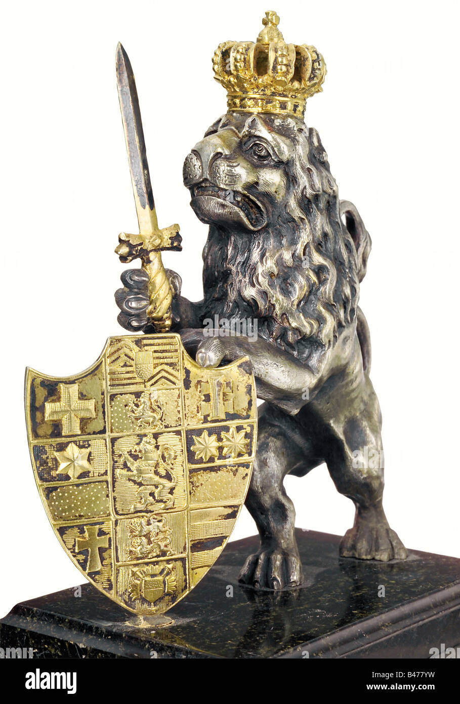 An officer's presentation gift, Fusilier Regiment von Gersdorff (Hessian Electorate) No. 80. A rampant silver lion with a gold plated crown, sword and shield. The shield bears the coat of arms of the Electorate of Hesse. The shield is engraved on the back, 'In Happy Memory of your Service with the Regiment 30 October 1866-25 July 1875, and after 1 January 1901.' Metal parts tarnished. On a black marble base, with the silver regimental cipher on the front, and a dedication plate below, 'To their honoured regimental comrade, His Excellency, Generalleutnant z.D. (, Stock Photo