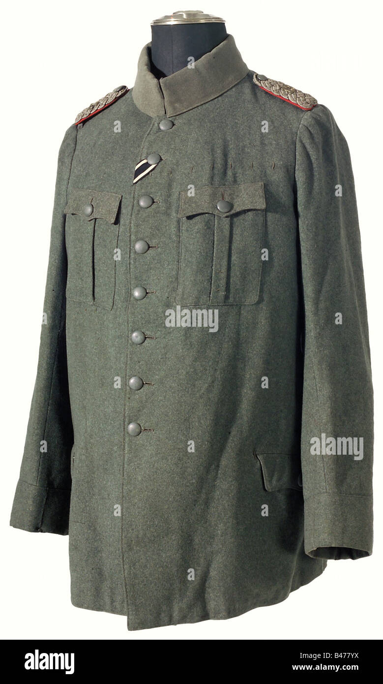 A tunic for a major, in the Provisional Reichswehr. As worn after 1919.  Converted World War tunic, field grey cloth, Iron Cross ribbon in the  button hole, rounded cuffs. Light traces of