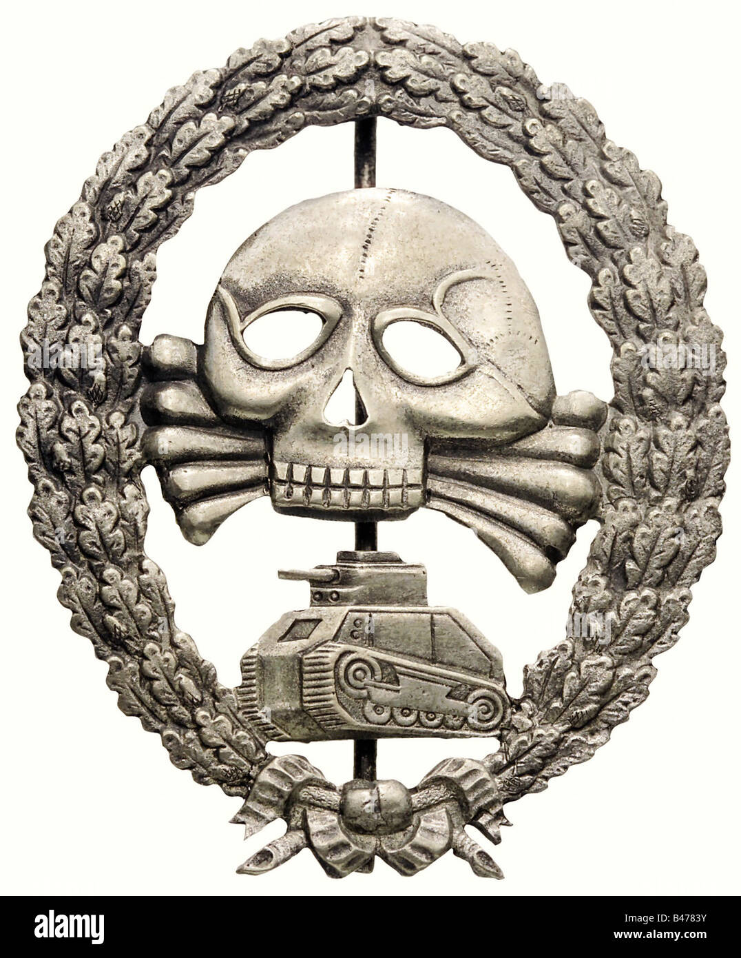 A Tank Badge, of the Legion Condor, 2nd type. Silver plated bronze, hollow stamped, non-magnetic wire pin. Weight 13.5 g. Slightly worn. The wreath is broken next to the bow. Including a photo expertise by Detlev Niemann. historic, historical, 1930s, 1930s, 20th century, awards, award, German Reich, Third Reich, Nazi era, National Socialism, object, objects, stills, medal, decoration, medals, decorations, clipping, cut out, cut-out, cut-outs, honor, honour, National Socialist, Nazi, Nazi period, symbol, symbols, emblem, emblems, insignia, Stock Photo