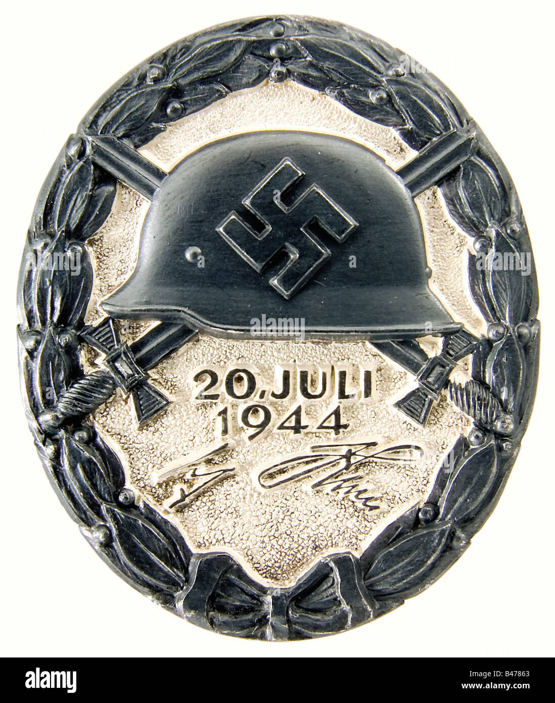 A Wound Badge 20 July, 1944 in Black., In original presentation case. Silver, with areas of patination. Reverse stamped 'L/12' for C.E. Juncker Berlin and '800'. 44.47 x 37.22 mm, weight 38.98 g (OEK 3849). Original black presentation case, the interior lined in black velvet and white silk, magnetic fittings. Of extreme rarity, only 23 were awarded in the three grades of gold, silver and black. Included is an expert opinion with photo by Detlev Niemann dated September 2005. historic, historical, 1930s, 20th century, awards, award, German Reich, Third Reich, Naz, Stock Photo