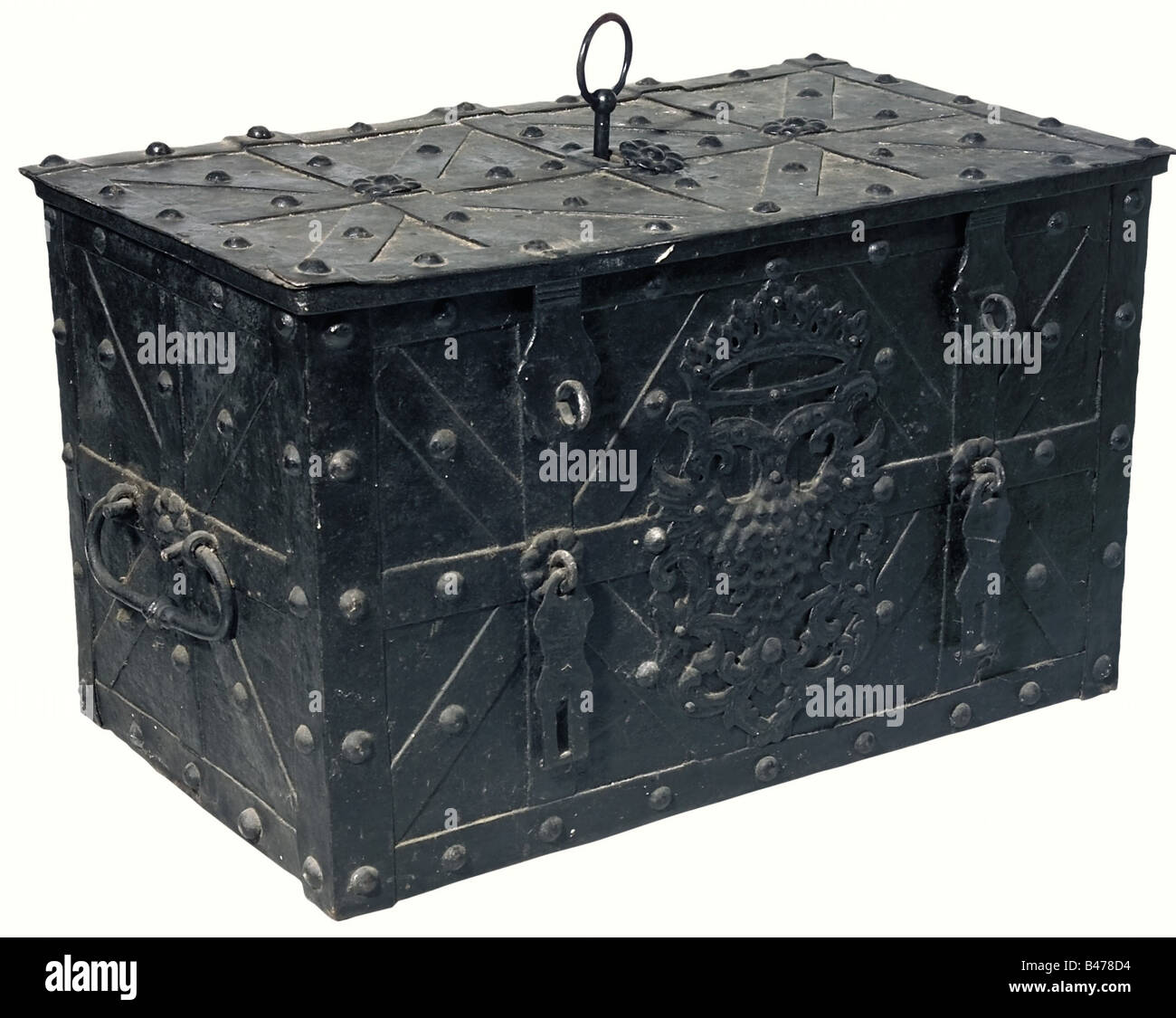A large German strongbox, 17th/18th century. A rectangular trunk of iron plate furnished with straps and stud rivets. The lid has a central keyhole, a spring loaded lock cover, lock with a hollow shank key and nine wards. The lock mechanism has a simple cover plate. The front bears a decorative double headed eagle, and two hasps for locks. There are two movable carrying handles on the sides. The interior has been recently lined with wood. Dimensions 55 x 91 x 55 cm. historic, historical,, 18th century, 17th century, handicrafts, handcraft, craft, object, object, Stock Photo