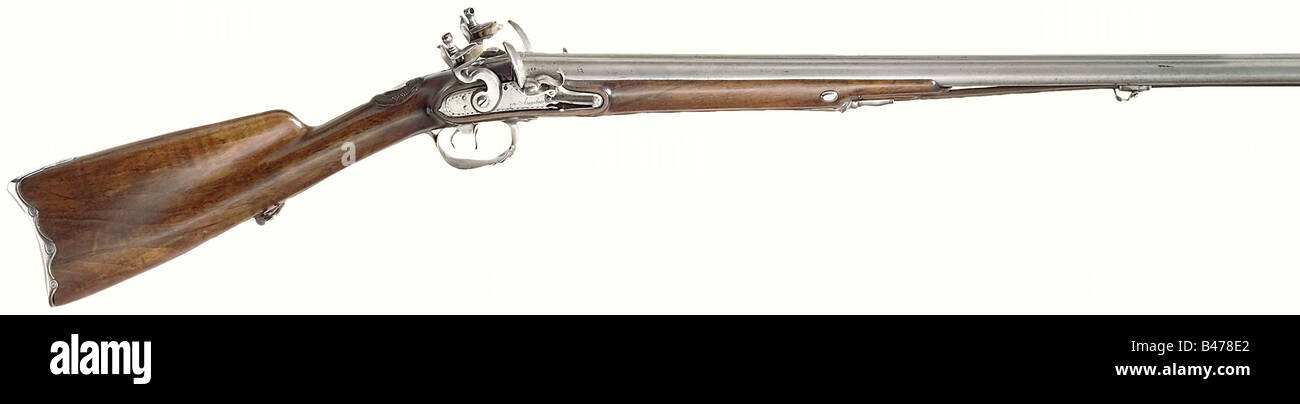 A double-barrelled shotgun, by Johann Adam Fiedler, Augsburg, end of the 18th century. Side-by-side barrels in 17 mm calibre, marked 'Fiedler in Augsburg' on the mid rib. Brass front sight. Restrained engraving on the locks with additional signatures. Retouched walnut stock with iron furniture. The silver escutcheon bears a monogram 'C'. Wooden ramrod with horn tip. Length 113 cm. Johann Adam Fiedler is documented in Augsburg for 1793/94. historic, historical, 18th century, civil long guns, gun, weapons, arms, weapon, arm, firearm, fire arm, gun, fire arms, fir, Stock Photo