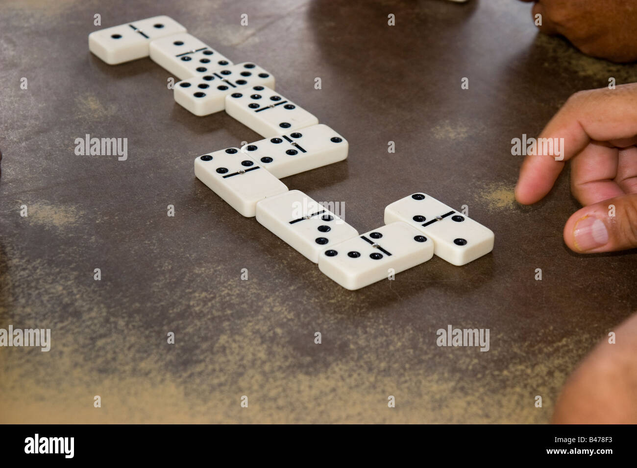 A group of men play dominoes in Anton, Province of Cocle, Republic of Panama, Central America Stock Photo