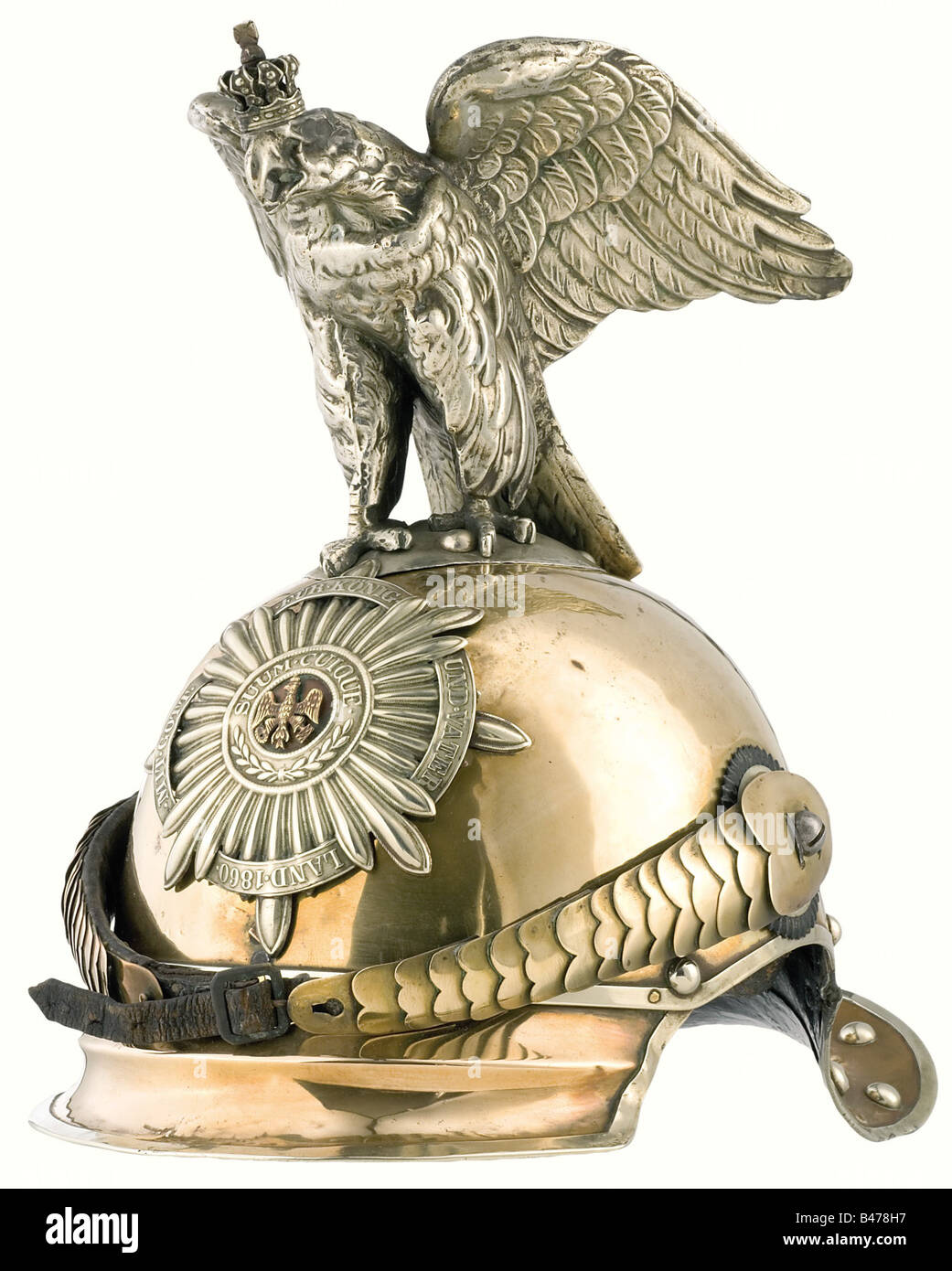 A parade version of the model 1867 helmet, for troopers of the Regiment Garde du Corps or the Cuirassier Guards Regiment. Tombac body with nickel-silver mountings and ball rivets. Nickel-silver star with applied black eagle and a separate fatherland scroll. Convex tombac metal chinscales with screws, small cockades. Parade eagle with silver crown. Leather lining. Numerous holes in the body underneath the plate and the base of the eagle. historic, historical, 19th century, Prussian, Prussia, German, Germany, militaria, military, object, objects, stills, clipping, Stock Photo