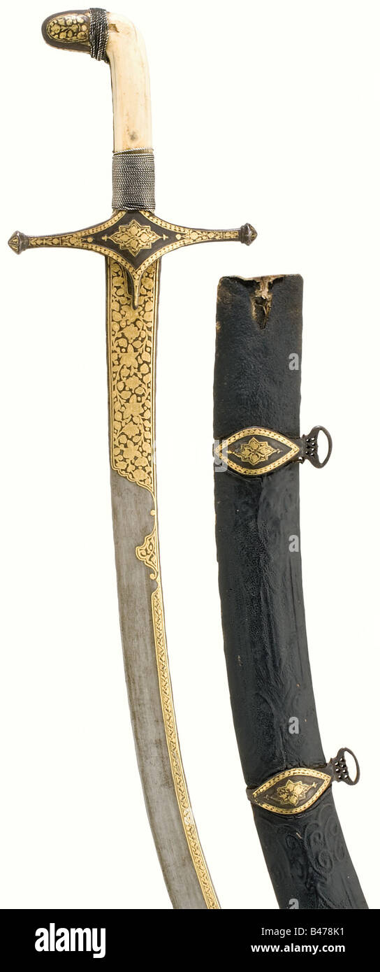 A gold inlaid shamshir, Persian, circa 1800. Curved single-edged blade ...