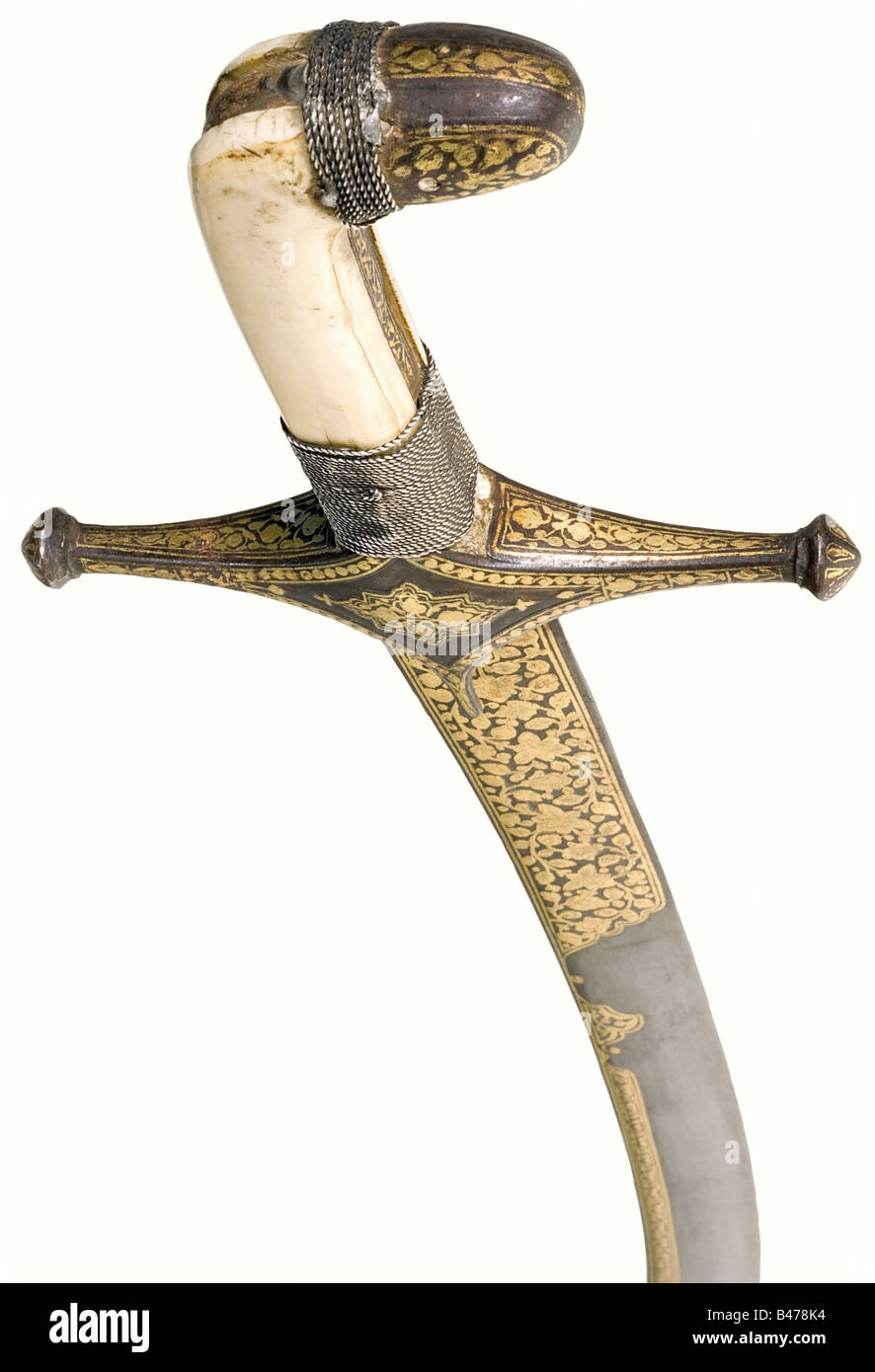 A gold inlaid shamshir, Persian, circa 1800. Curved single-edged blade ...