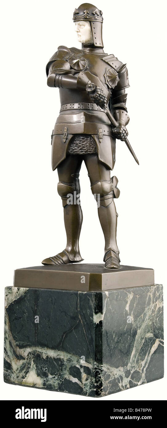 Julius Schmidt-Felling (1895 - 1930) - Knight, a bronze figure, the inset face carved ivory, first half of the 20th century. The knight is wearing late 15th century style armour and is in the process of drawing his sword. Rectangular base with bevelled edges, signed. The plinth is made of green marble. Height 36 cm. fine arts, people, fine arts, art, statuette, figurine, figurines, statuettes, sculpture, sculptures, helmet, helmets, protection, metal, object, objects, stills, clipping, clippings, cut out, cut-out, cut-outs, man, men, male, Artist's Copyright has not to be cleared Stock Photo