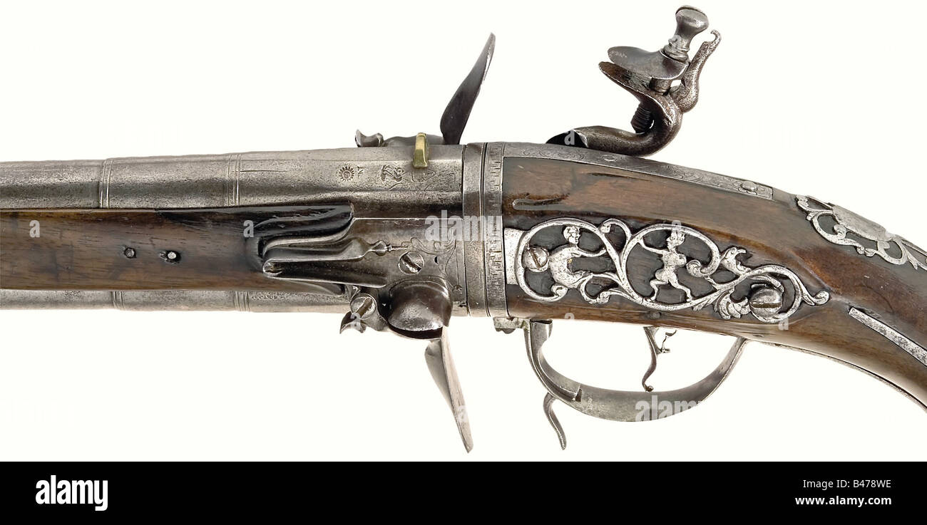 A doublebarrel turnover flintlock pistol, Gilles Desellier, Liège, end