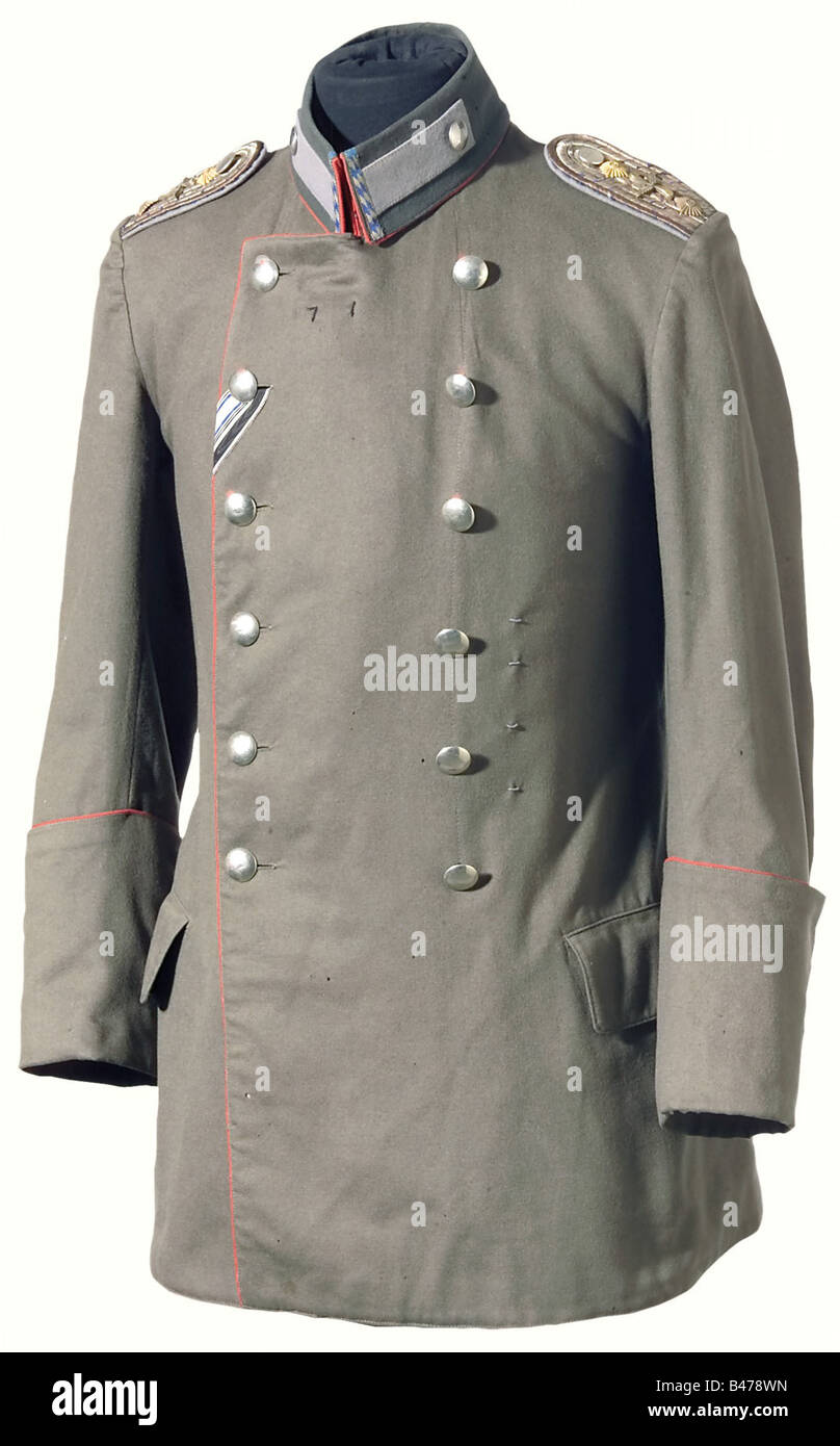 A model 1916 field grey litewka (short tunic), for a flying captain. Field grey cloth with red trim, stiff collar with insignia panel and gray lapels. Shoulder boards in light grey branch color with two rank stars and a winged propeller. Silver buttons. Ribbons for the Military Service Order and the Iron Cross. Very rare. historic, historical, 1910s, 20th century, Bavaria, Bavarian, German, Germany, Southern Germany, the South of Germany, object, objects, stills, militaria, clipping, cut out, cut-out, cut-outs, uniform, uniforms, clothing, clothes, outfit, outf, Stock Photo