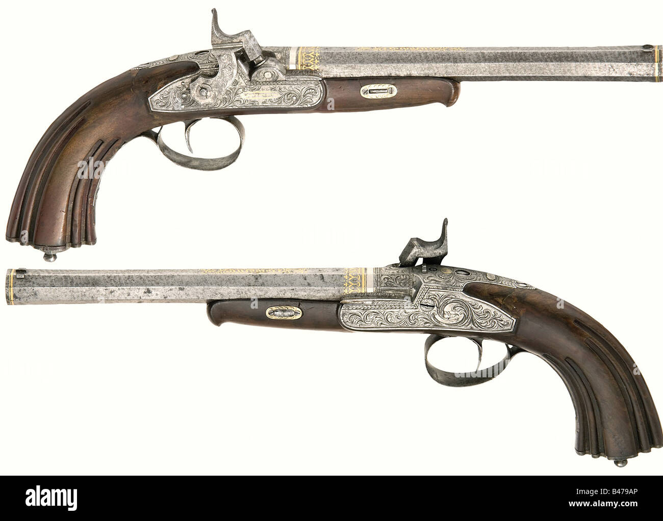 A cased pair of percussion pistols, Matthias Nowotny, Leitmeritz/Bohemia before 1838. Octagonal, slightly swamped Damascus barrels with hook breeches and microgroove rifling in 14 mm calibre. Each has a dovetailed iron front sight and adjustable rear sight with gold bands on the muzzles. The chambers and signature 'Nowotny' have decorative gold inlay and the engraved tangs are inscribed in gold '1' and '2' respectively, and each bears the silver 'VR' monogram beneath a crown. The percussion locks have fine floral engraving and are inscribed 'a Leitmeritz' in go, Stock Photo