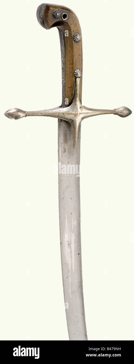 An Ottoman silvermounted kilij, circa 1800. Curved singleedged blade