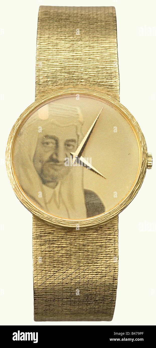 King Faisal Ibn Abdul Aziz al-Saud (1906 - 1975)., A golden presentation wrist watch, Geneva, circa 1970. Chopard automatic watch with sapphire crystal and golden wrist strap. The gold dial bears the of King Faisal. A 750 gold hallmark stamped on the clasp. Works are intact. Length 20 cm. Weight 93.5 grams. historic, historical, people, 1960s, 1970s, 20th century, Ottoman Empire, object, objects, stills, clipping, clippings, cut out, cut-out, cut-outs, clock, clocks, watch, watches, timepiece, Stock Photo