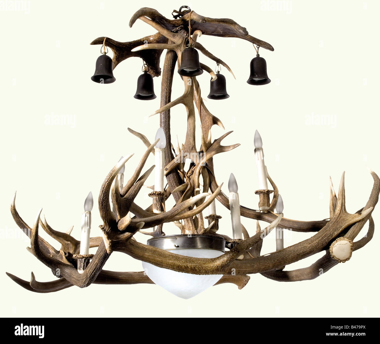 An antler chandelier., A large chandelier assembled from antler tines. Eight electrical standing lights, five hanging lights, and general illumination in the centre. Diameter 130 cm. Height ca. 100 cm. Not tested for function. Needs some repair. historic, historical hunt, hunts, hunting, utensil, piece of equipment, utensils, trophies, object, objects, stills, clipping, clippings, cut out, cut-out, cut-outs, Stock Photo