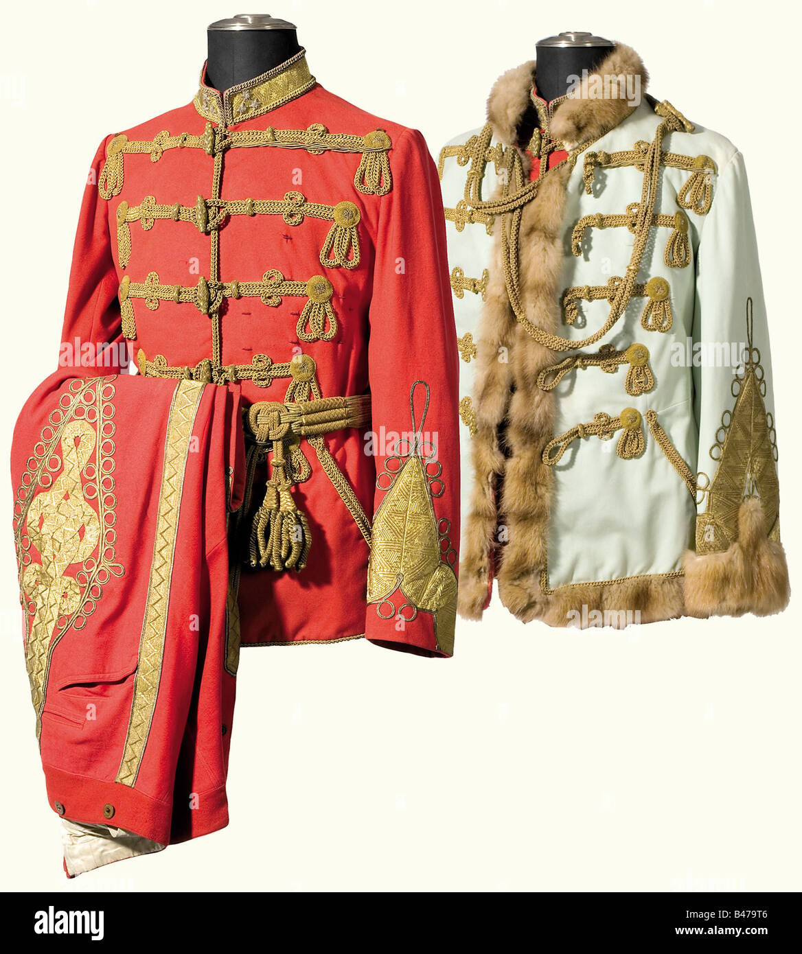 An Austrian Cavalry General's uniform, in Hungarian gala style, circa 1900 An attila of fine scarlet cloth with gold cord fastenings, olives and rosettes in braided gold, gold lace and embroidery on the collar and sleeves, very beautiful gold cord on the back. The slanted side pockets have golden chain-cord edging, numerous decoration loops, red and white silk lining with marks of ware and age. A pelisse of fine white (bluish) cloth trimmed with mink, golden cord fastenings, olives and rosettes in braided gold, gold lace and embroidery on the collar and sleeves, Stock Photo