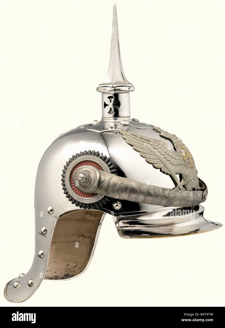 A reserve officer's helmet, for the Prussian Mounted Jäger Regiments 1 - 6 Late, elegant model from circa 1914. Nickel-plated steel bowl with nickel-plated or nickel silver mountings. The neck protector is of tombac with an attached ridge. The removable grooved spike (somewhat damaged) has a bayonet catch. Officers' cockades, non-standard silver (really gilded) convex metal chinscales of tombac, without the cloverleaf attachments. Brim and neck protector are leather lined (somewhat spotted). Leather sweatband (handwritten inscription, 'Fähnrich Jäger z. Pferd R, Stock Photo