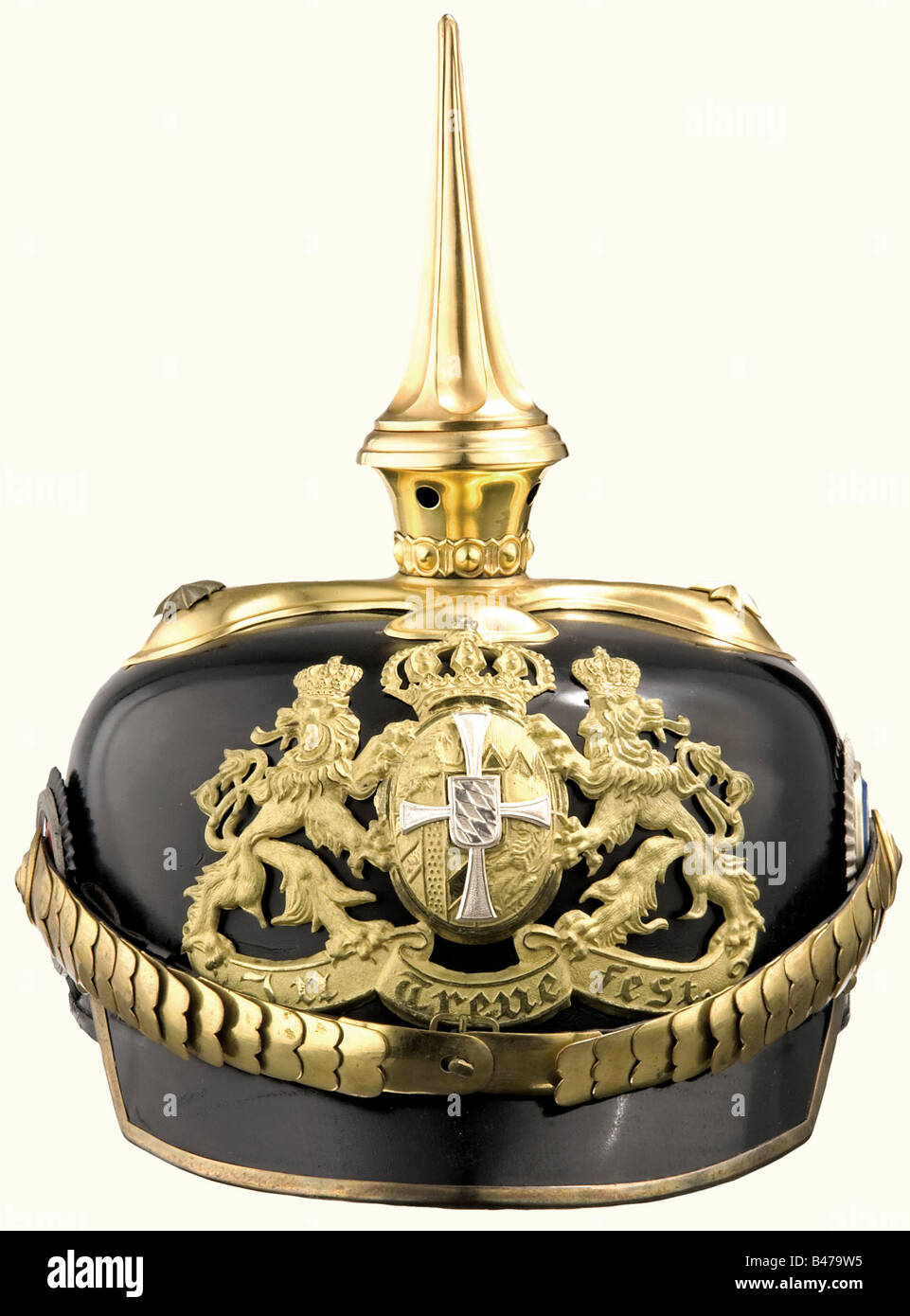 A model 1886/09 helmet for a Reserve Officer, of the Bavarian 2nd Heavy Cavalry Regiment or the 1, 3, 5 and 7 Chevauleger Regiments Black felt bowl with gold plated mountings. Small gilded emblem in the version after 1909 with a silver reserve cross. Screw dismountable spike. Cambered metal chinscales on rosettes. Both cockades. Green sweatband. Clear ribbed silk lining. Size 56. Exterior almost like new. Marks of wear on the inside. Very beautiful, unaltered helmet. historic, historical, 1900s, 20th century, 19th century, Bavaria, Bavarian, German, Germany, So, Stock Photo