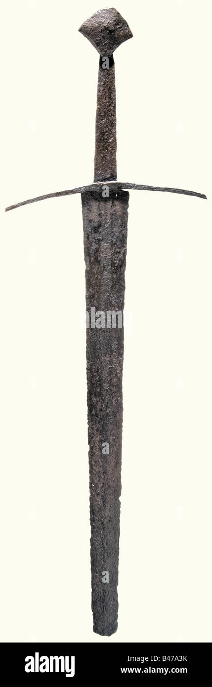A knightly sword, German, circa 1300 Broad, double-edged blade with a ...