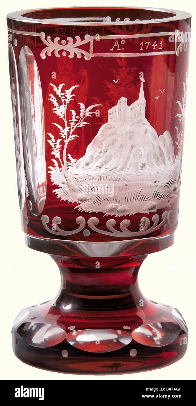 Archduke Franz Ferdinand of Austria-Este - a Bohemian glass goblet from the Konopischt Castle., Ruby flashed glass, 19th century, with a depiction of the legendary Pandour leader 'Obrist Trenk' on the front of the glass, with Saldenburg shown on the back. Round base with a prism cut. Height 15.5 cm historic, historical, 19th century, Imperial, Austria, Austrian, Danube Monarchy, Empire, object, objects, stills, clipping, clippings, cut out, cut-out, cut-outs, vessel, vessels, Stock Photo