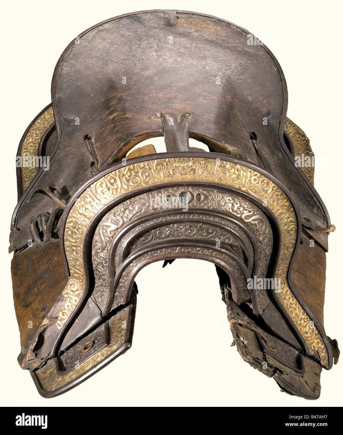 A magnificent saddle, Tibet, 19th century Partially leather covered wooden construction, both cantle and saddletree are mounted with fine relief decoration in silver and brass, a little loose at the left edge. All pieces are tied together with straps and reins. Length 55 cm. historic, historical, 19th century, Far East, Far Eastern, weapon, arms, weapons, arms, military, militaria, clipping, cut out, cut-out, cut-outs, object, objects, stills, Stock Photo