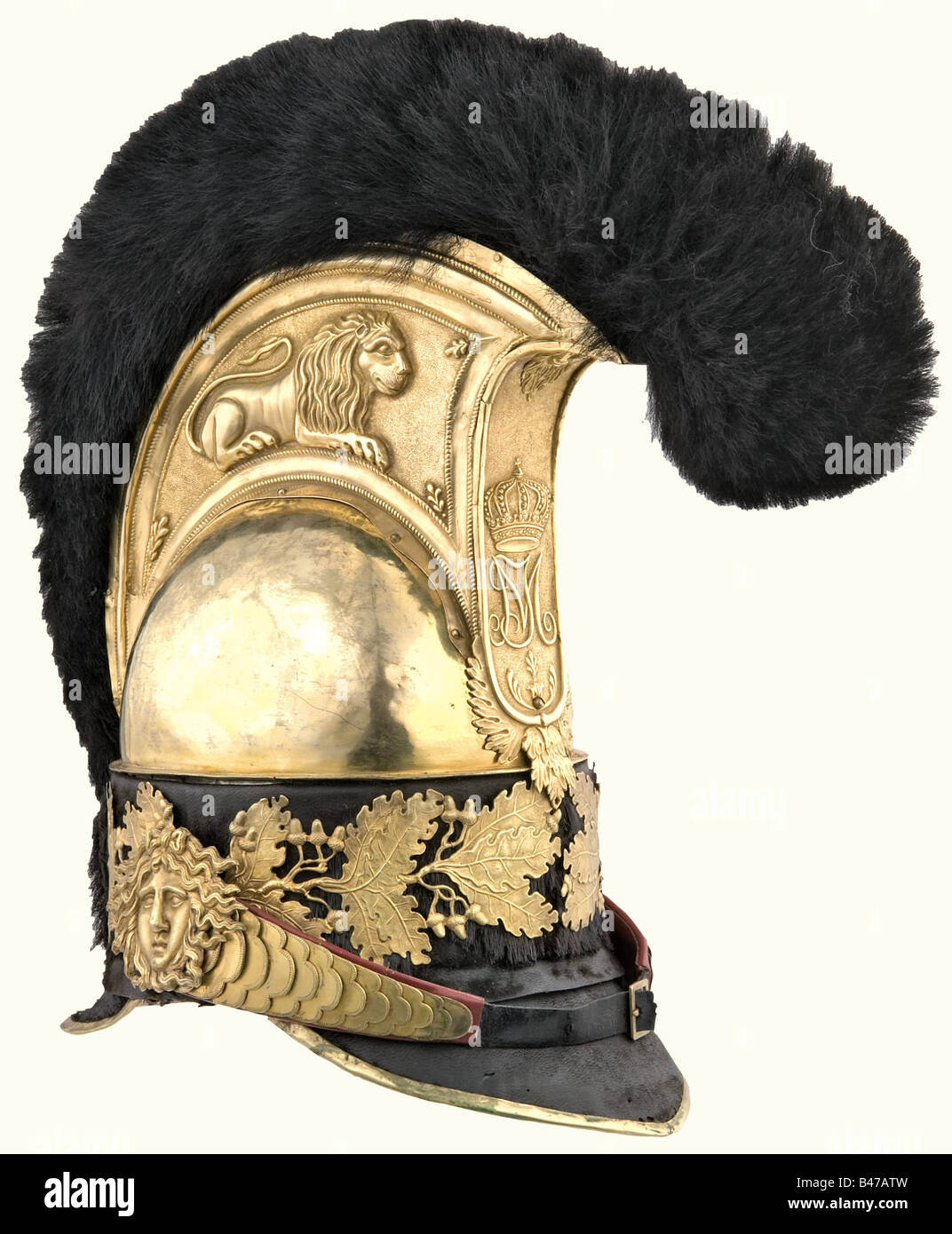 An officer's helmet, 1814 - 1825, Bavaria, Garde du Corps Regiment Fire-gilded brass skull and finely shaped comb with a recumbent lion. Band and brim are covered with sealskin and gilded oak leaves. Silver-plated cockade. Original bearskin chenille, leather lining. Chin straps on Medusa heads. The backing for the metal chinstrap was replaced for the centennial celebration in 1914. The owner's name "Spengel" (Knight of the Military Max-Joseph Order) scratched into the front brim. In 1823, there were only 22 officers in the regiment. As the regiment had only bee, Stock Photo