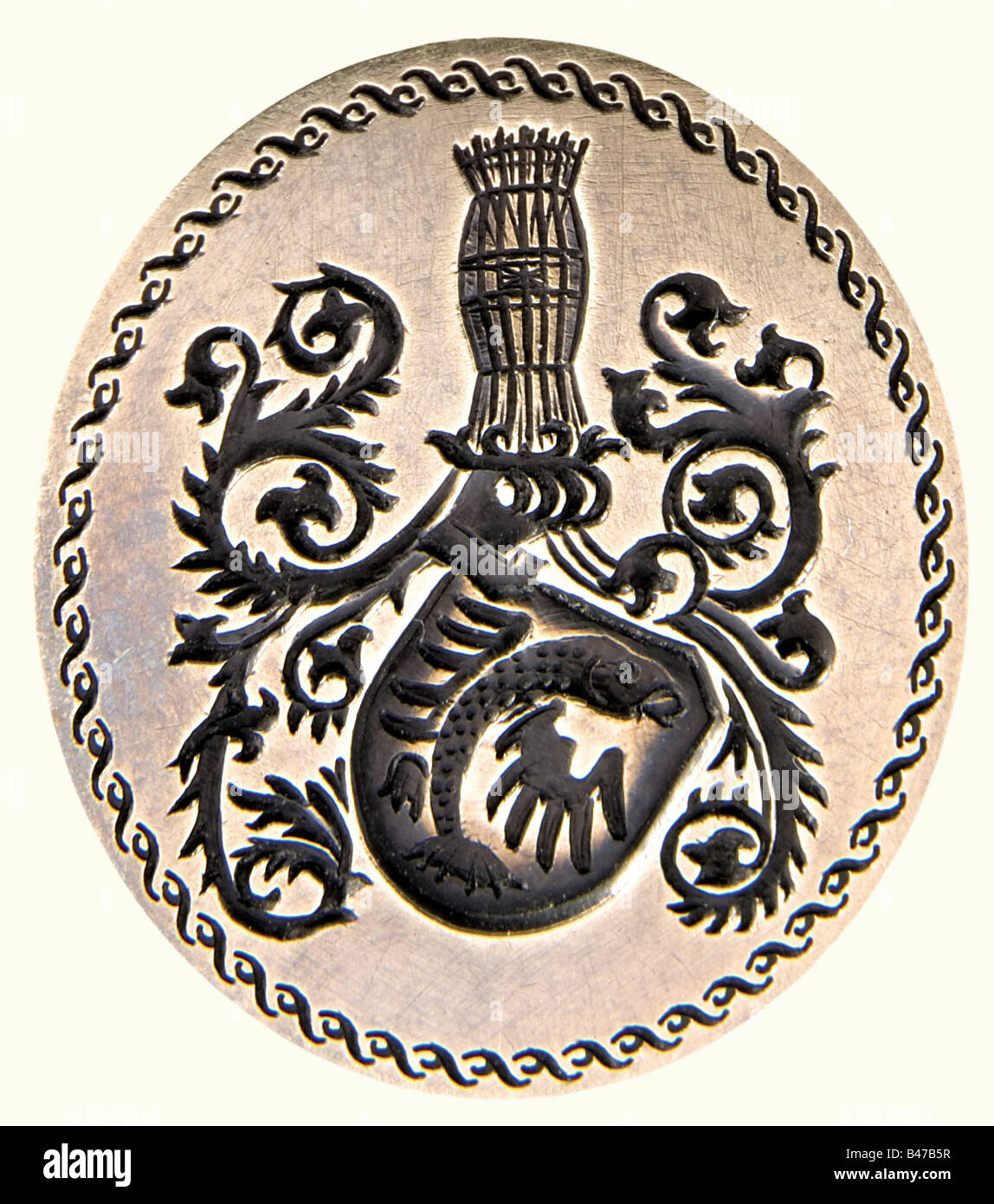 Annette von Droste-Hülshoff (1797 - 1848), a seal with ivory handle of the German poetess Coat of arms carved in brass, the shield with a winged fish, above a helmet and fish trap. The ivory handle is probably from an earlier period and shows a three-dimensionally carved female with a child on her arm and two at her feet. Height 69 mm. Enclosed a gilt-edged album with about 20 poems of various artists, written in ink, and different handwritings, one poem presumably by Annette von Droste-Hülshoff (partially monogramed 'A'), labelled on the lower edge 'nach Herde, Stock Photo
