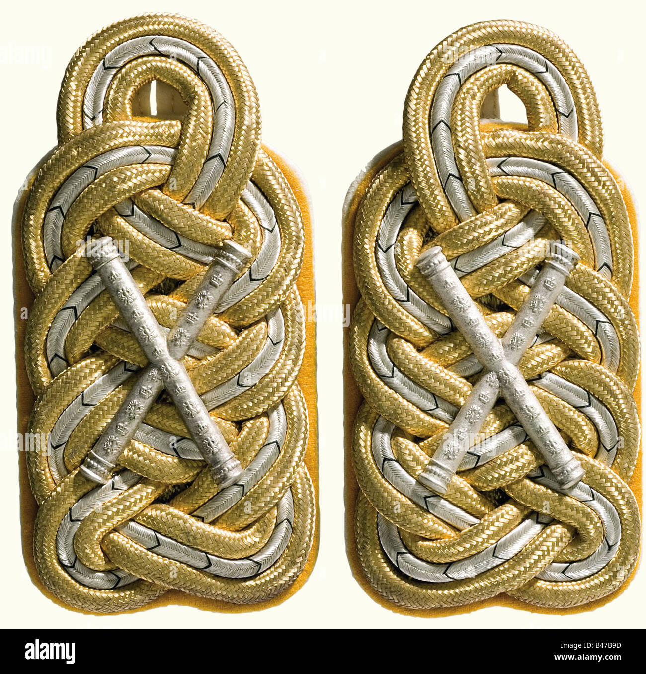 Field Marshal Paul von Hindenburg, a pair of epaulets as Field Marshal and à la suite in the 3. Garde-Regiment zu Fuß Large pattern from 1915 with gold/silver weave on white backing and yellow additional colour with silver marshal's batons (slightly darkened).Paul von Hindenburg was promoted to field marshal on 27 November 1914. historic, historical, 1910s, 20th century, First World War / WWI, world war, world wars, military, militaria, clipping, cut out, cut-out, cut-outs, object, objects, stills, fine arts, art, art object, art objects, artful, precious, coll, Stock Photo