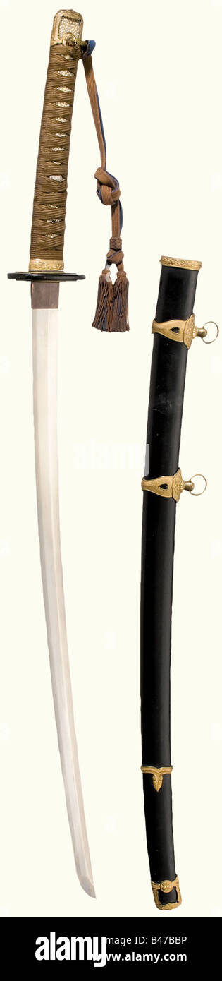 A kai-gunto, Japan, for naval officers, dated 1928 Shinogi tsukuri blade, chu kissaki, mune takashi. Weak sugu ha hamon. Boshi not identifiable. Muji tetsu. Nakago with one mekugi ana. Suji kai yasuri me. Inscribed, 'Showa Ju Roku Nen Ku Gatsu Yoshi Jitsu (September 1928) - Ama Teru Yama...Saku.' Copper habaki. Wooden, black lacquered saya. Lacquer has small restorations. Quality mountings of gilded brass. Cherry blossom decoration on nanako background. Black lacquered leather tsuba with gilded o seppa. Menuki in the shape of the Tokugawa mon. Brown silk wrappi, Stock Photo