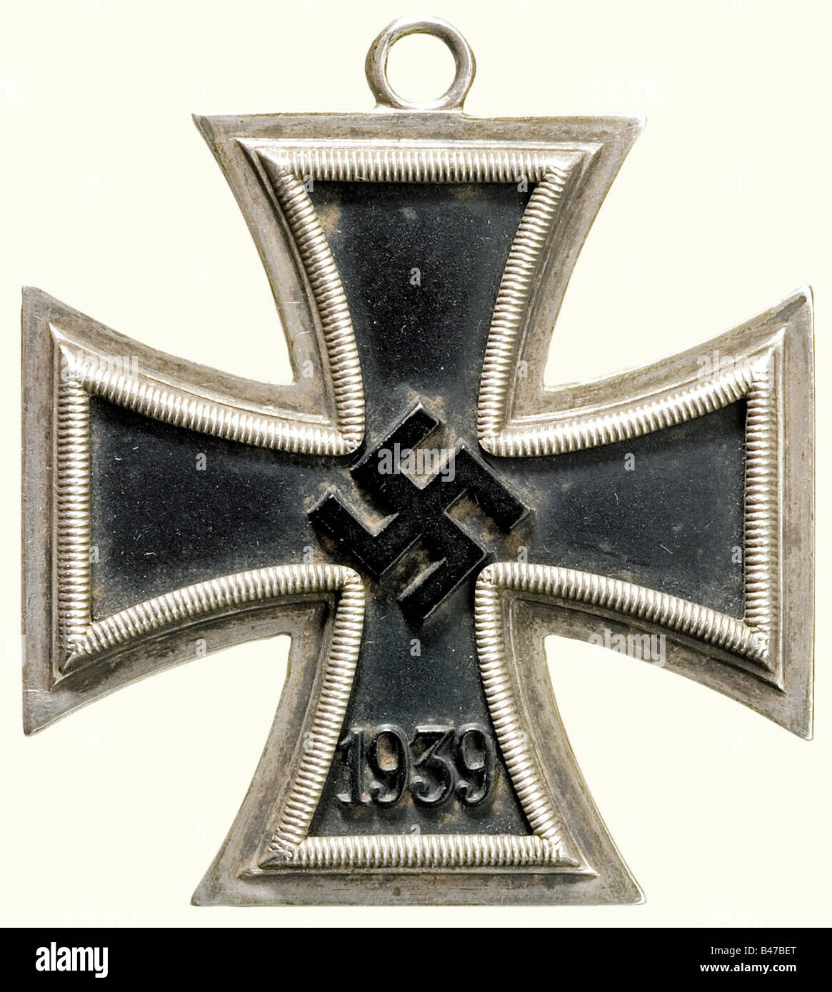 Major General Friedrich Z., a Knight's Cross of the Iron Cross on 2 June 1942 as Commanding Officer, 113th Infantry Division Knight's Cross of the Iron Cross of 1939, iron core with rim-high swastika, silver frame with reverse stamped '800' and L/12 for C.E. Juncker. Weight 33.3 g. Suspension ring missing. Included is a non-customized piece of ribbon, circa 40 cm in typical later light-red colour (OEK 3821). historic, historical, 1930s, 1930s, 20th century, army, armies, armed forces, military, militaria, object, objects, stills, clipping, clippings, cut out, c, Stock Photo