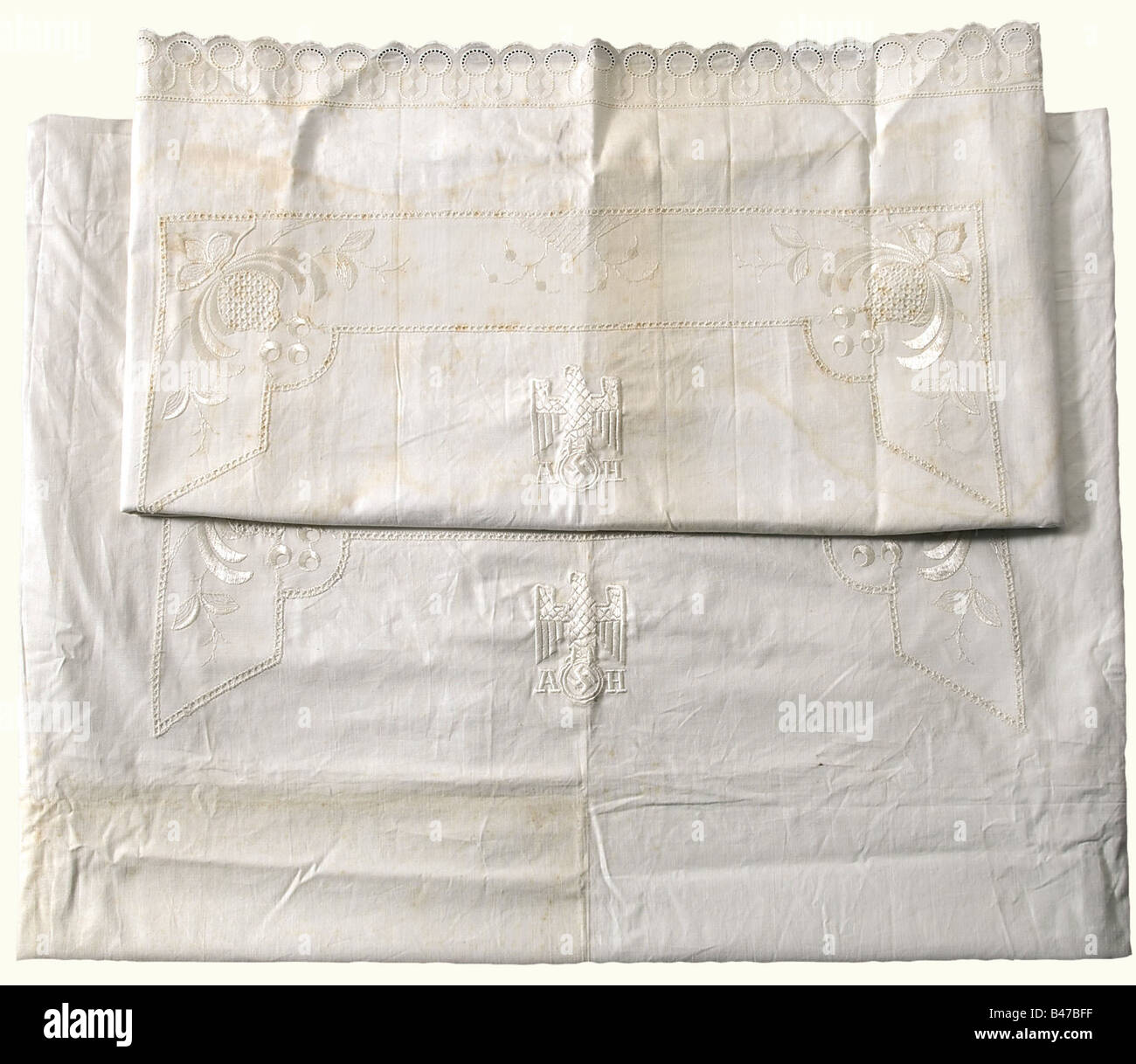 Adolf Hitler, his personal bedclothes Pillow case and duvet cover made as described before with the party eagle embroidered in white silk in the centre of each, flanked by the initials 'A' and 'H'. Ca. 75 x 75 and 120 x 175 cm respectively. Undamaged, (mould-)stained in places. historic, historical, 1930s, 1930s, 20th century, NS, National Socialism, Nazism, Third Reich, German Reich, Germany, German, National Socialist, Nazi, Nazi period, fascism, fine arts, art, art object, art objects, artful, precious, collectible, collector's item, collectibles, collector', Stock Photo