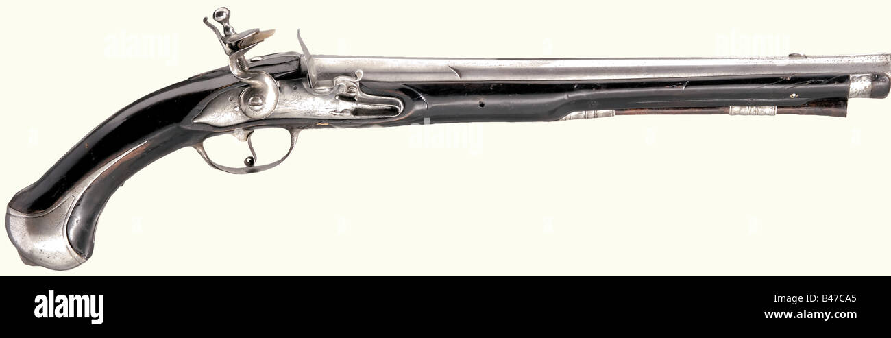 A cavalry pistol, circa 1700. Polygonal barrel merging to round with smooth bore in 17 mm calibre and a slightly swamped muzzle. The mark 'ZEL' (for Zella-Mehlis/Suhl) is stamped on the side of the breech. Iron front sight and crenate tang. Iron lock with later floral engraving. The blackened wooden stock (restored break in the region of the lock) has an iron nose cap and furniture. Wooden ramrod with iron tip. Length 56 cm. Cf. Udo Vollmer, Deutsche Militär-Handfeuerwaffen, Vol. 2 - Saxony. Position No. 35. historic, historical, 18th century, Saxony, Saxonia, , Stock Photo