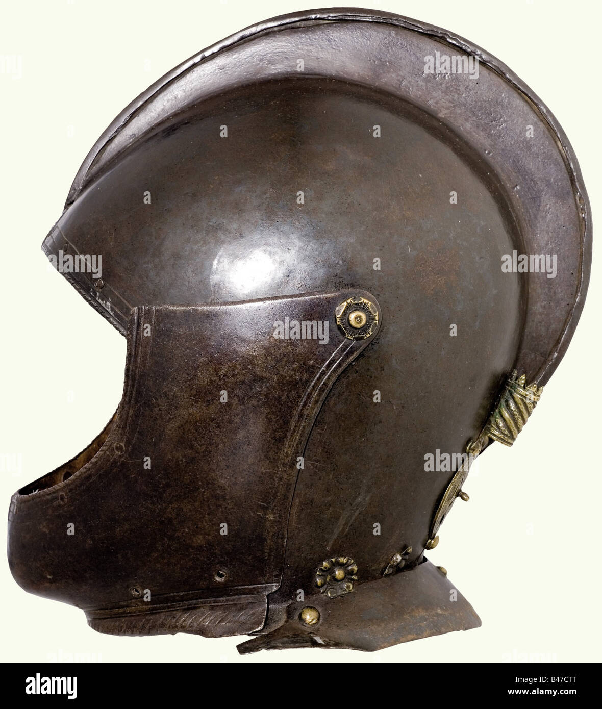 An Italian heavy burgonet, circa 1620. Two-piece, blackened heavy skull with a turned under comb and a face opening with a corded edge. Cut brass plume socket riveted on the back. Movable bevor with side-mounted hook latch. Riveted (incomplete) neck protector. Skull has (later?) linen lining. Height 28 cm. historic, historical, 17th century, weapons, arms, weapon, arm, fighting device, object, objects, stills, clipping, clippings, cut out, cut-out, cut-outs, utensil, piece of equipment, utensils, plating, armour-plating, armour, armor, reactive armour, armour s, Stock Photo