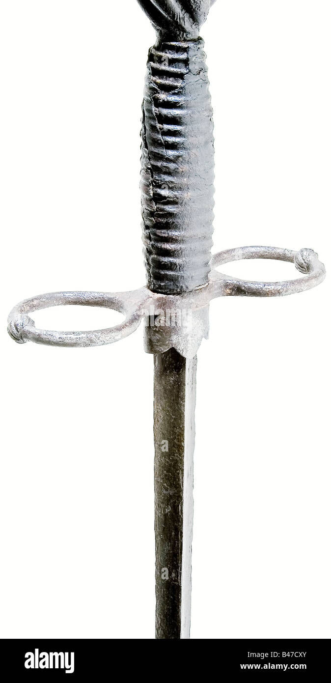 A German estoc, 1st quarter of the 16th century. A straight, lightly hollow ground, quadrangular blade. Iron quillons formed of two rings with a spirally chiselled spherical bulge and a copper-soldered scabbard sleeve. Pear-shaped iron pommel chiselled in a deep spiral. The wooden grip has a well-made replacement leather grip cover over cord wrapping. Signs of heavy corrosion in places. Length 117 cm. Cf. Landes-Zeughaus Graz for four very similar estocs, as well as Sotheby's 21 May 1974, 'Counts von Giech' Part 1, No. 58. historic, historical, 16th century, sw, Stock Photo