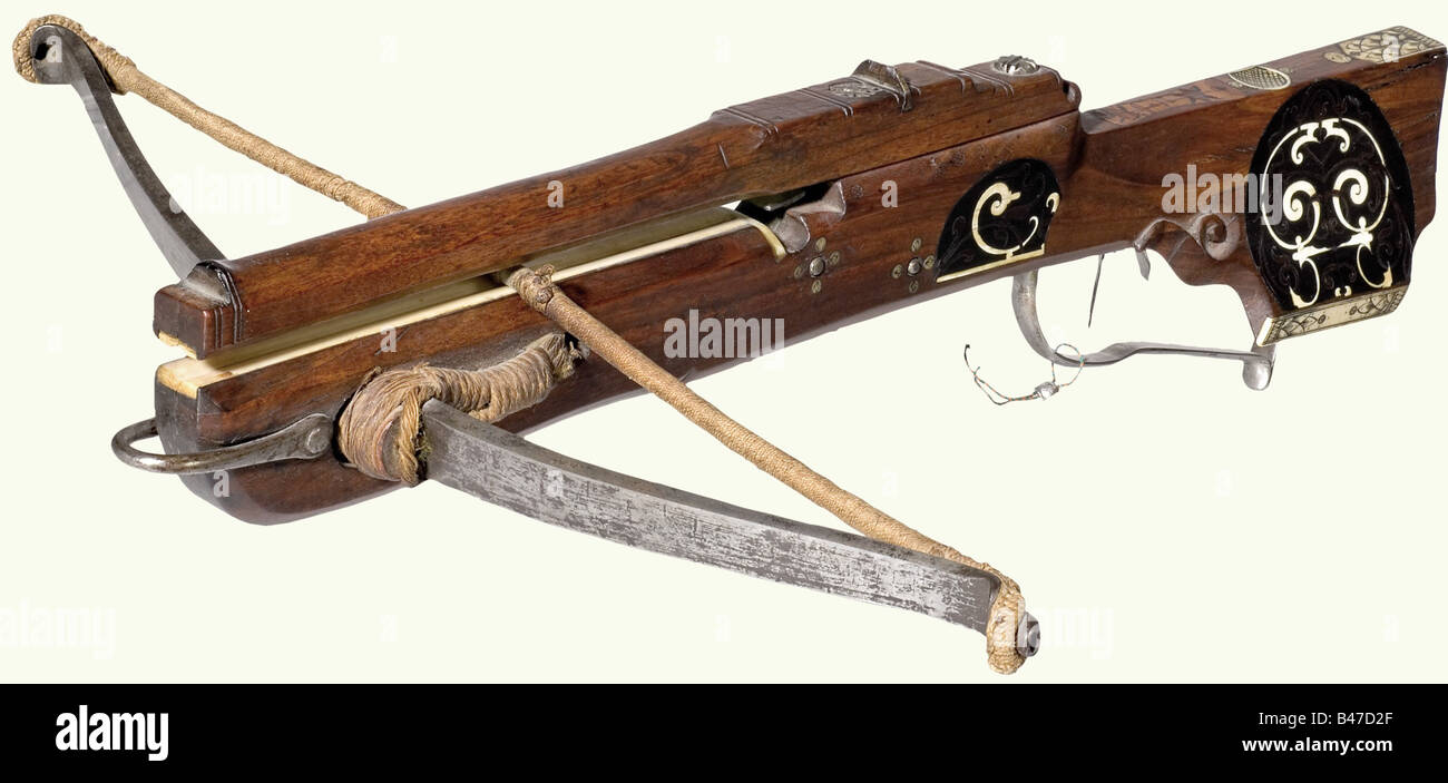 A German Hunting Sporting Crossbow Circa 17 Iron Prod With Original Cord Bridle And Twisted Bow String Carved Walnut Tiller Lavishly Inlaid With Bone And Various Coloured Woods Engraved And Blackened Bone Patch