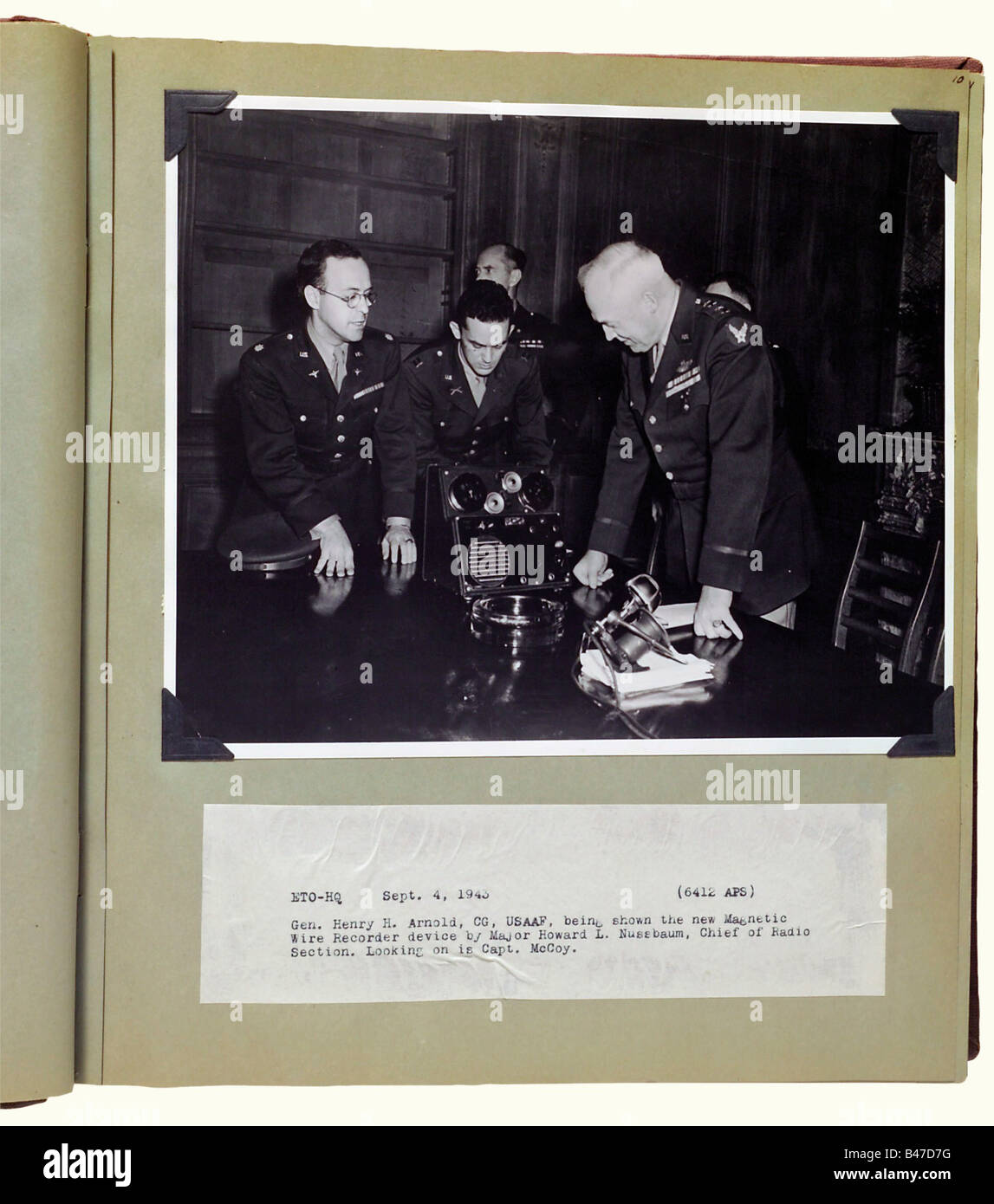 A document legacy, for two brothers with the United States Overseas Forces during 1942 - 1947. Three large format albums with red linen binding stamped in gold, two of them cased. Numerous photographs including training in the United States, action aboard bombers, and photographs of the European theater of war (France, especially around Bastogne, Belgium, and Germany). A variety of documents (draft notice, ID tags, rank insignia, etc.), including reports and letters, with a transcription of the first radio transmission from a B-17 Flying Fortress in action and , Stock Photo
