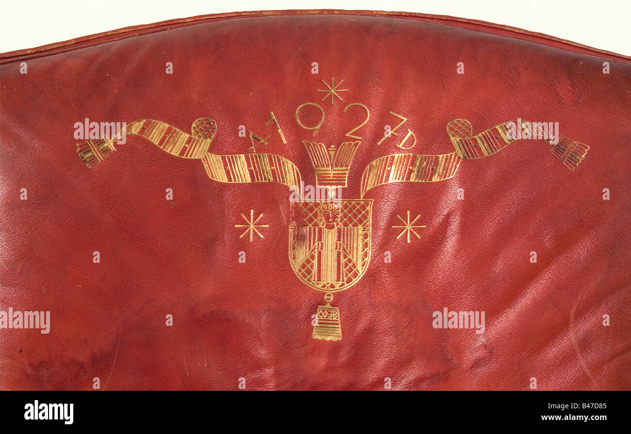 Pope Pius XII - a presentation arm chair from Prince Alfons of Bavaria, for the 1926/27 New Year to HE Msgr. Dr. Eugen Pacelli, Archbishop of Sardes and Papal Nuncio in Berlin. Red Morocco leather stamped in gold. The Munich coat of arms is on the back with a waving scrol historic, historical, 1920s, 20th century, object, objects, stills, clipping, clippings, cut out, cut-out, cut-outs, insignia, symbols, symbol, emblem, emblems, Stock Photo