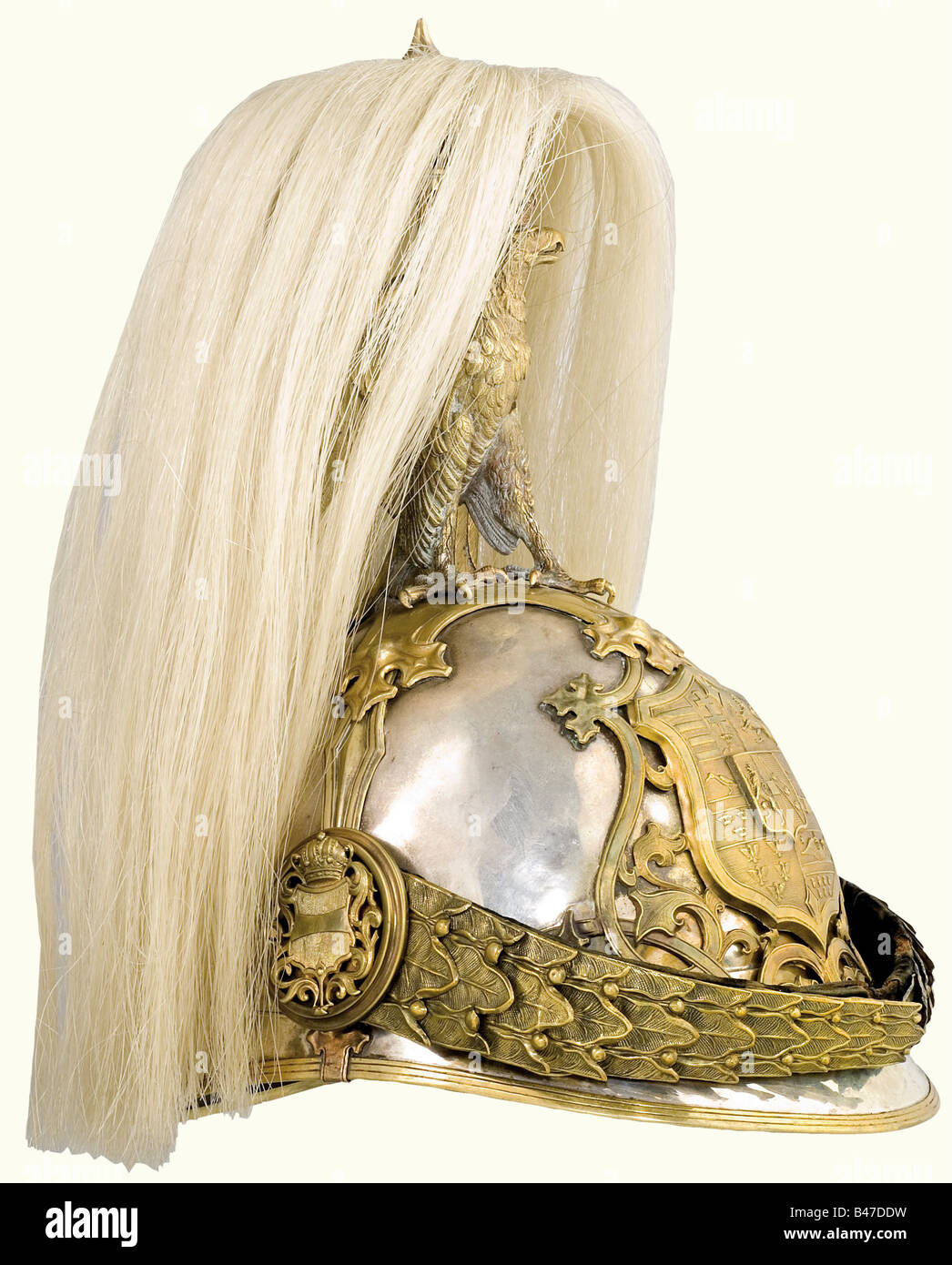 A helmet for the k.u.k First Arcieren Life Guards, according to the 1905 regular for equipment and uniforms of the First Arcieren Life Guards. Silver skull, with incomplete Diana head's silver hallmark (800), the master's mark 'HS' on the nape. Armoury stamps 'N31' and '37D'. The bronze, crowned double eagle and the beautifully worked mountings are fire-gilded with abrasions in places. The metal chinscales are backed with black velvet. Black coloured silk lining, artificial leather sweatband. White horse hair plume to be mounted behind the neck of the double ea, Stock Photo