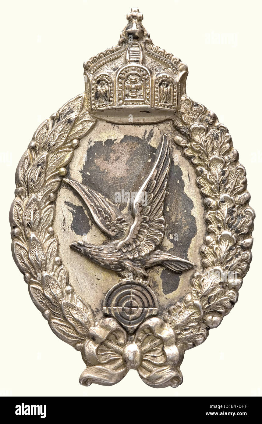 An Air Gunner Badge, Silver, hollow stamped and backed, two-piece design with rivets, reverse with '925' and maker's mark (Meybauer?). Weight 26 g (OEK 3289). In an old Hemmerle case, not original to the piece. historic, historical, 19th century, medal, decoration, medals, decorations, badge of honour, badge of honor, badges of honour, badges of honor, object, objects, stills, clipping, clippings, cut out, cut-out, cut-outs, Stock Photo