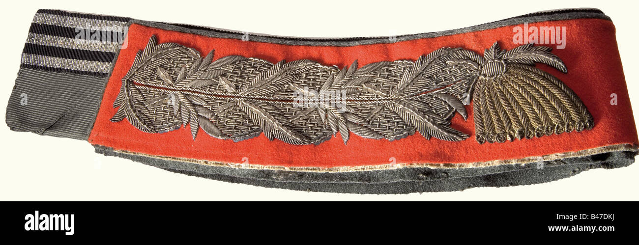 Kaiser Wilhelm II - a collar for the 1915 field grey uniform, of the 5th Foot Guards Regiment. Red cloth with the regiment's characteristic silver embroidery. Field grey piping. There is a smaller version of the Pour le mèrite ribbon sewn on the upper half of the collar tie with three(!) silver interweaves for the award of the oak leaves. From 12 May 1915, Kaiser Wilhelm II wore the oak leaves to the Pour le mérite. historic, historical, 1910s, 20th century, Prussian, Prussia, German, Germany, militaria, military, object, objects, stills, clipping, clippings, c, Stock Photo