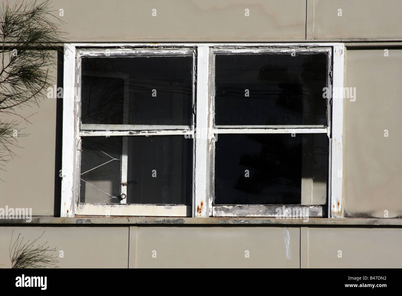 BROKEN WINDOW IN DERELICT HOUSE HORIZONTAL BAPDB11219 Stock Photo