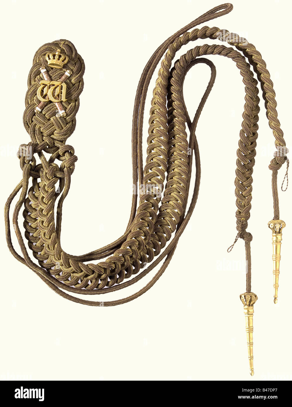 Kaiser Wilhelm II - an aiguillette for his Grand Admiral's uniform., A shoulder knot woven from twisted gold cord, divided into two woven strands, which terminate in crowned golden points. Superimposed with two crossed, gilded Grand Admiral's batons, enamelled red, and white, and with the crowned cipher 'W' on top, the insignia of an aide-de-camp to his grandfather, Wilhelm I. The gilding on the cord and the weave is somewhat worn and darkened. Dark blue cloth backing with two pins and a button-on attachment flap. At the request of the Imperial Navy, Wilhelm II, Stock Photo