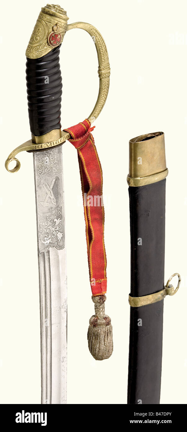 A model 1909 officers shashqa for Bravery, with the Order of St. Anne 4th Class and the St. Anne Swordknot. Single-edged blade (rust-pitted) with fullers and etched floral decoration on both sides. Master's name 'Abakarov' with crossed hammer and tongs on the obverse side, the picture of a horseman on the reverse side. Brass knuckle bow hilt, with the cipher 'N II' and the Order of St. Anne superimposed on the pommel cap. The Cyrillic inscription 'For Bravery' is engraved on each side of the knucklebow. Fluted plastic grip. Black leather-covered scabbard with b, Stock Photo